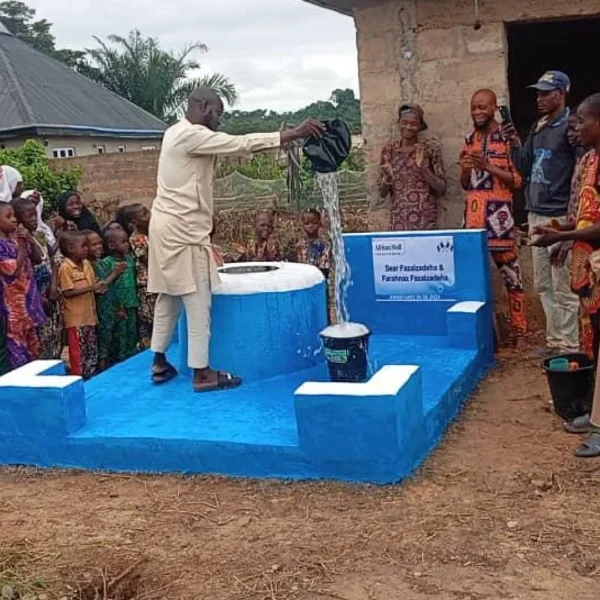 Traditional water well with buckets in Nigeria